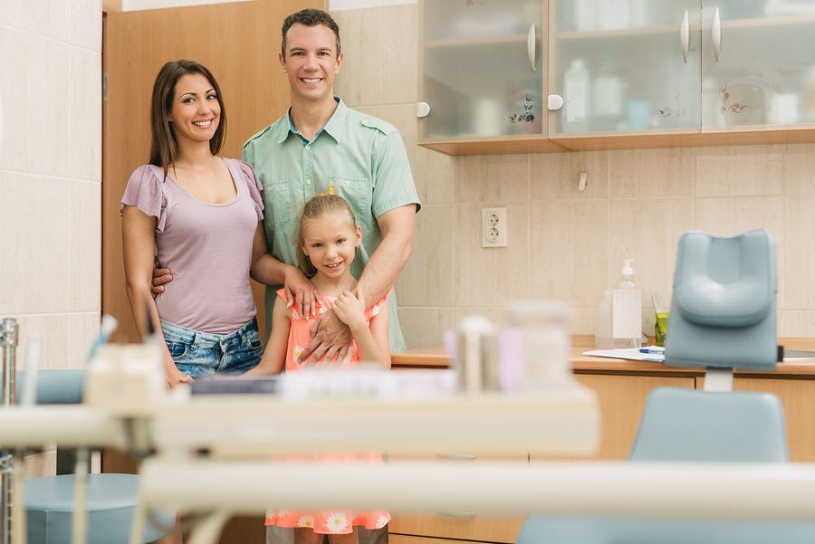 A family visiting a dental clinic together