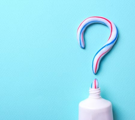Symbol of question mark from toothpaste. Copy space for text