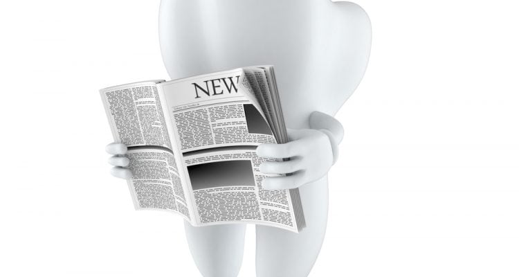 Tooth character reading newspaper on white background